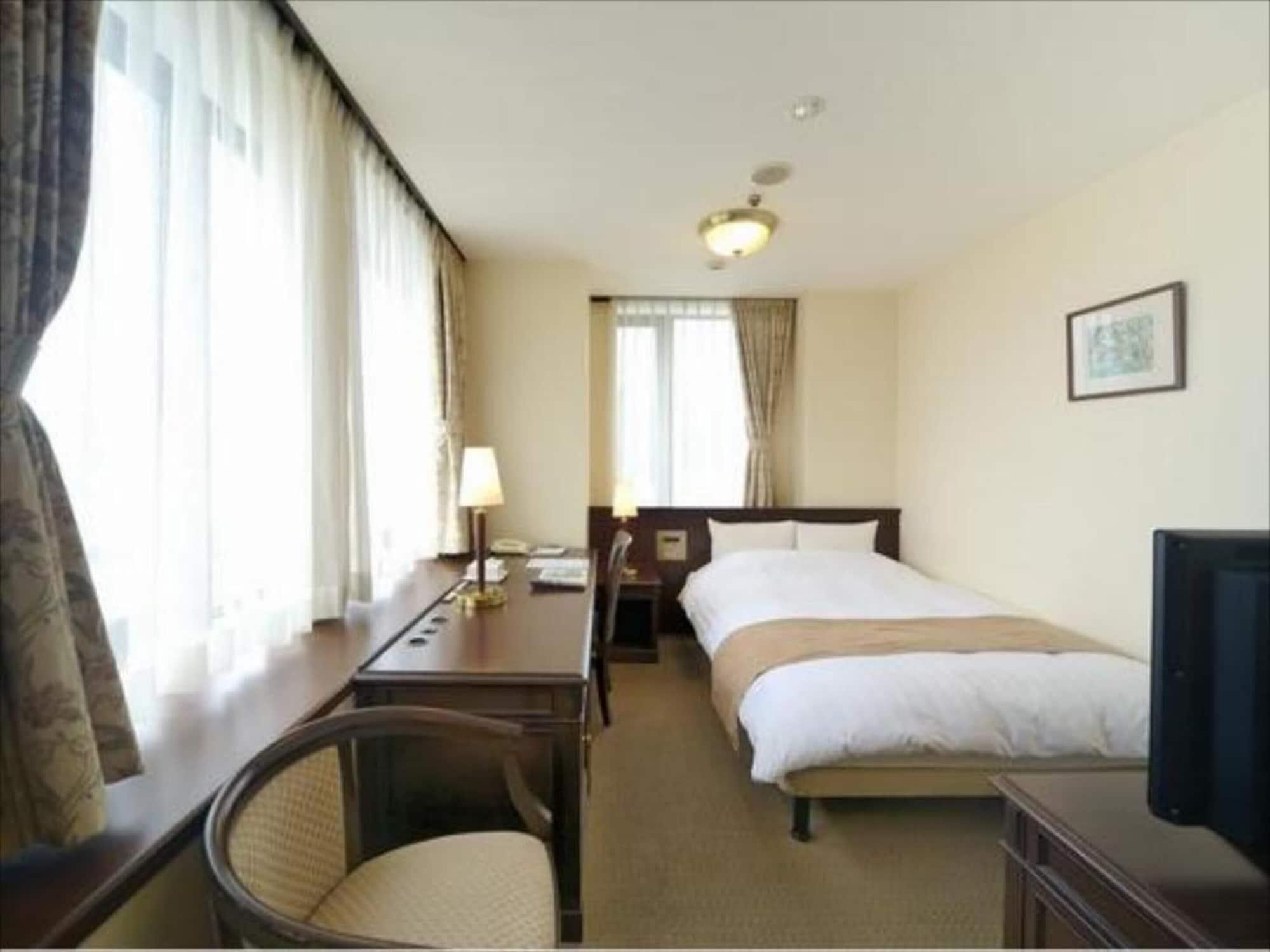 Amami Sunplaza Hotel Bagian luar foto