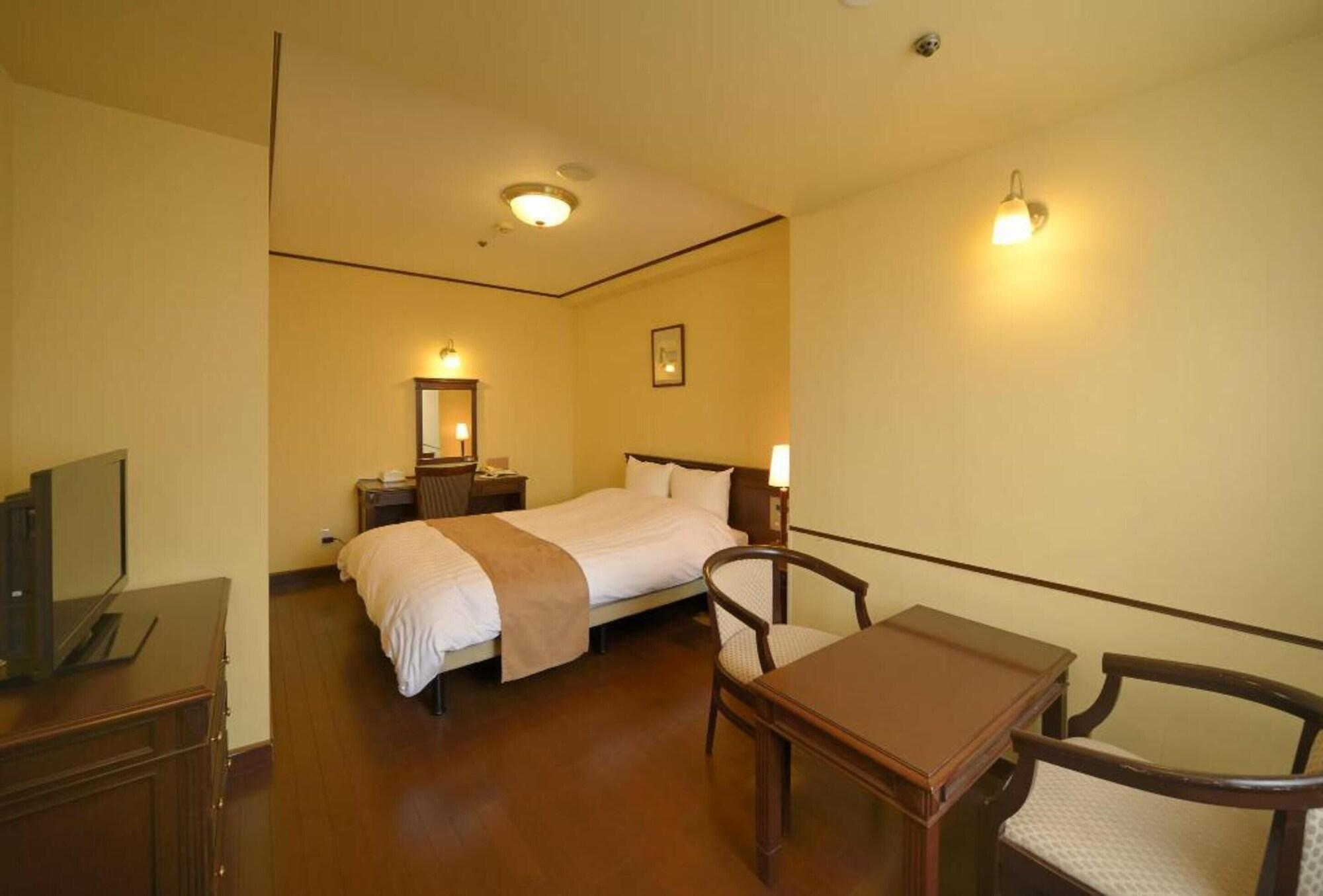 Amami Sunplaza Hotel Bagian luar foto