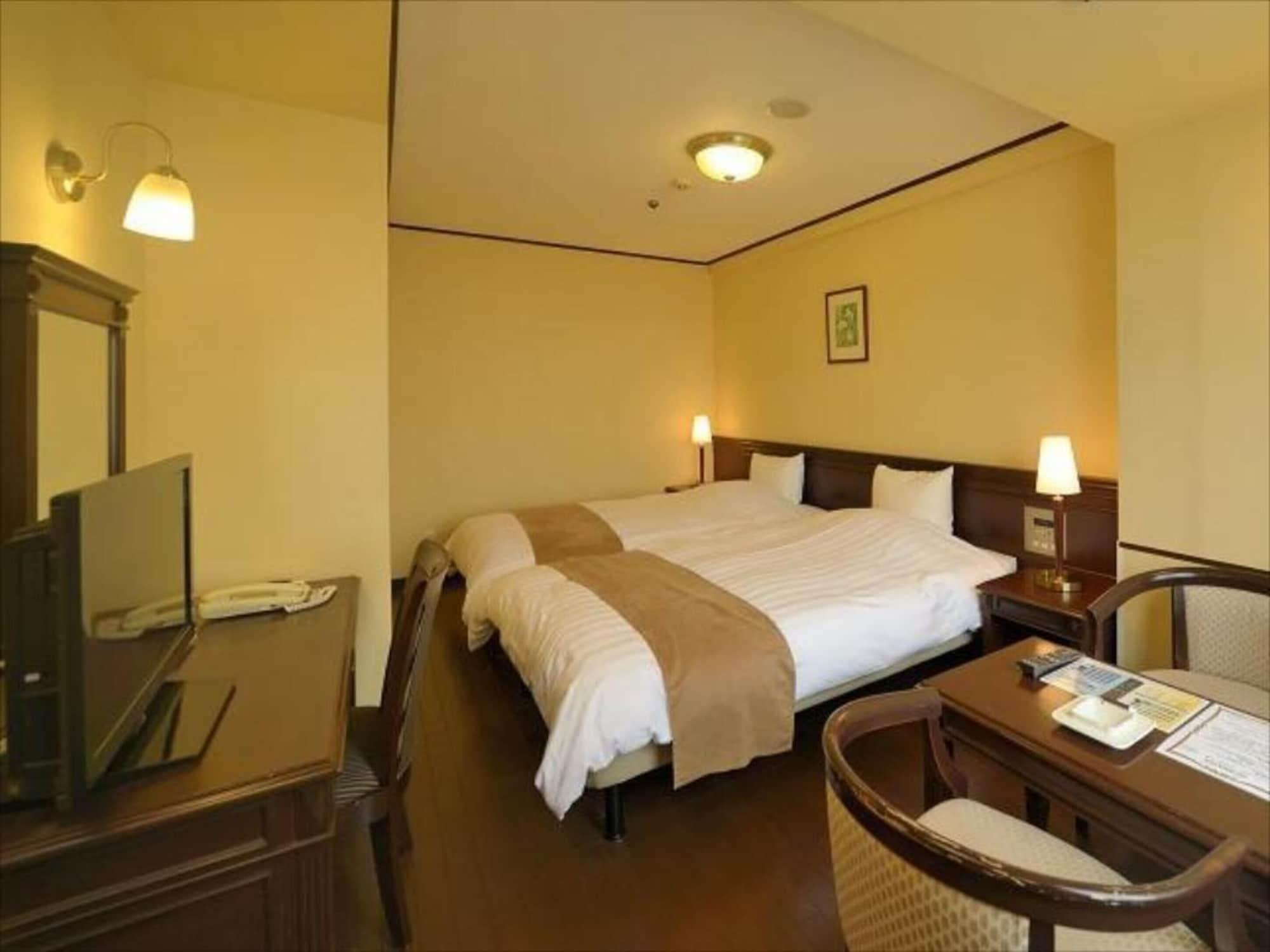 Amami Sunplaza Hotel Bagian luar foto