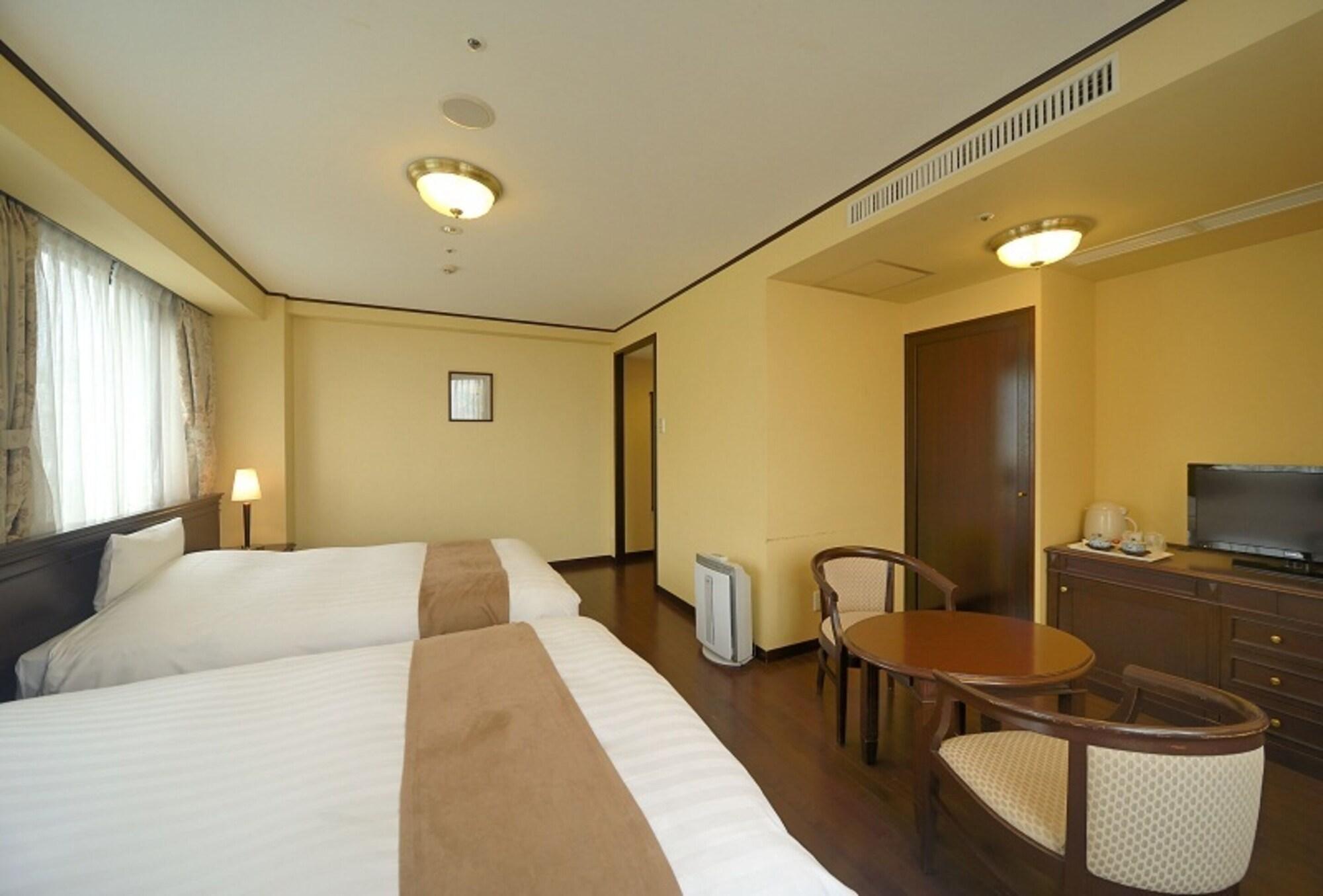 Amami Sunplaza Hotel Bagian luar foto