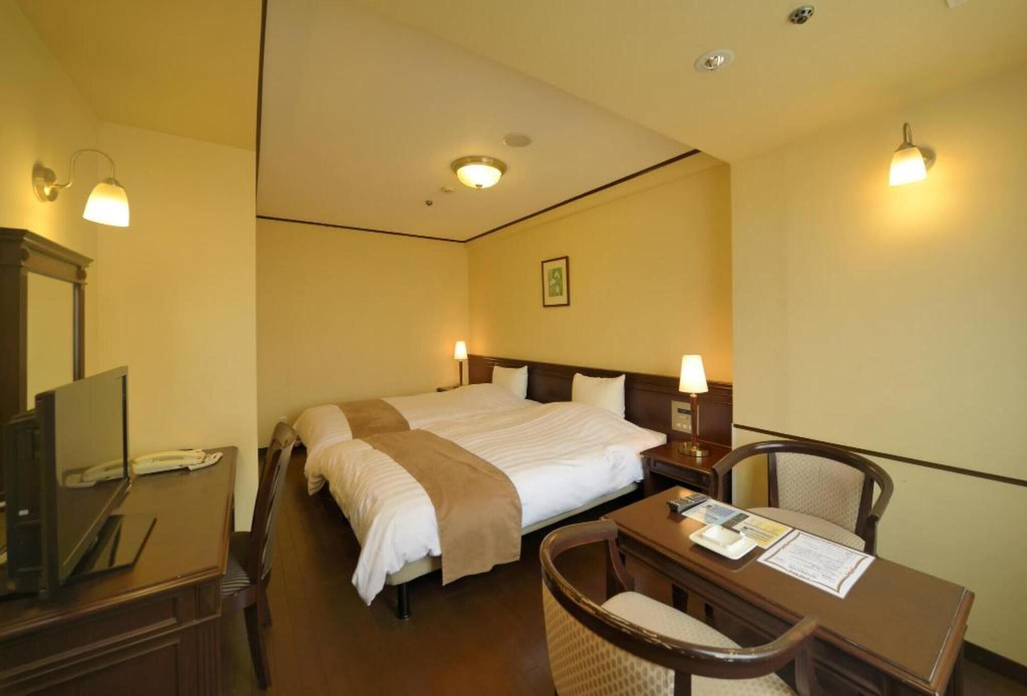 Amami Sunplaza Hotel Bagian luar foto