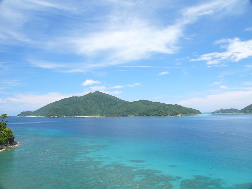 Amami Sunplaza Hotel Bagian luar foto