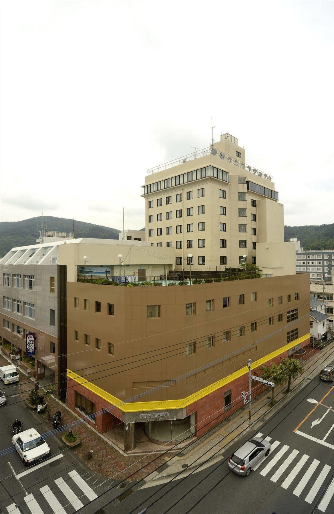 Amami Sunplaza Hotel Bagian luar foto