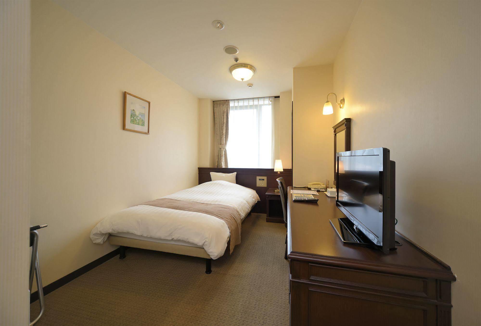 Amami Sunplaza Hotel Bagian luar foto