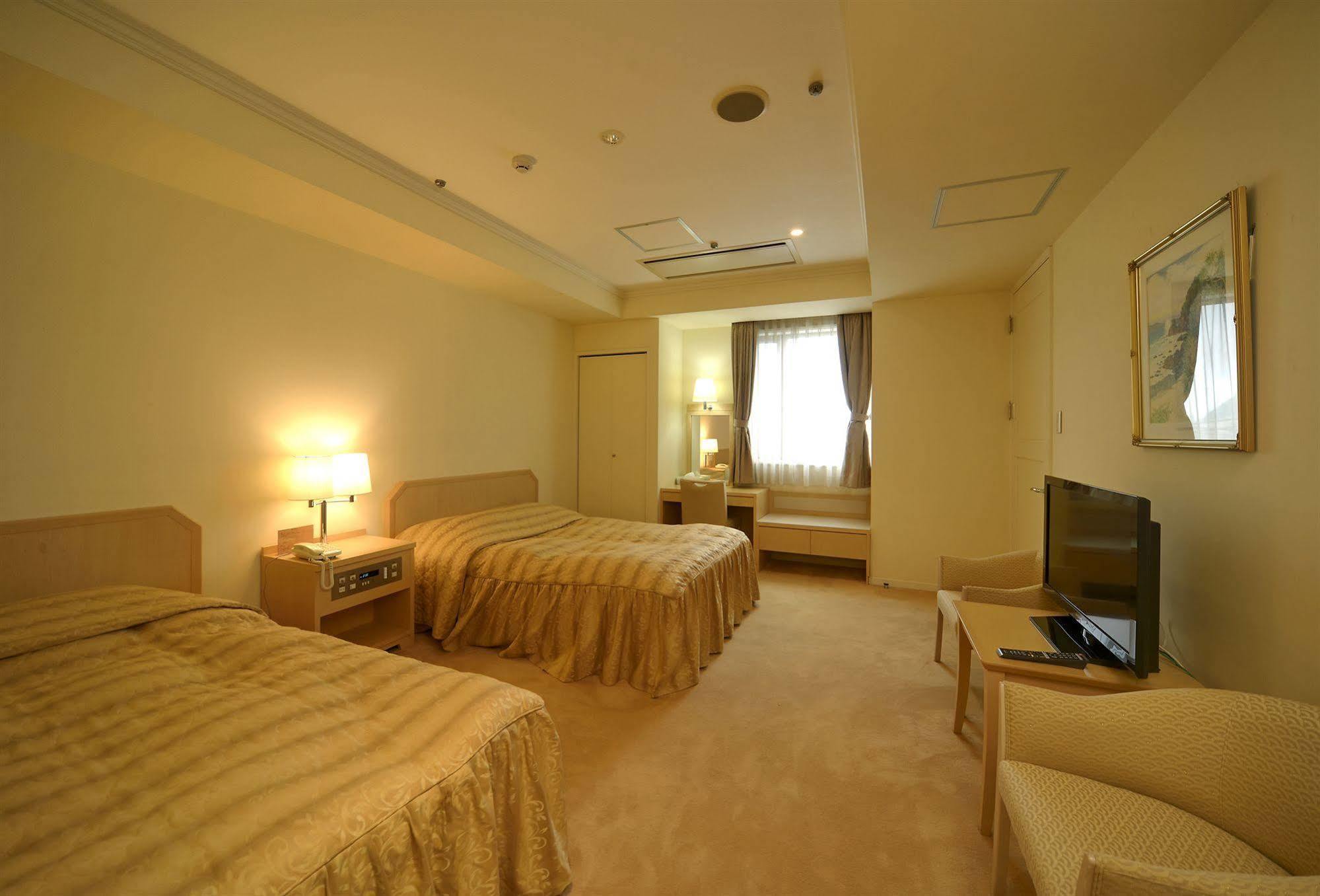 Amami Sunplaza Hotel Bagian luar foto