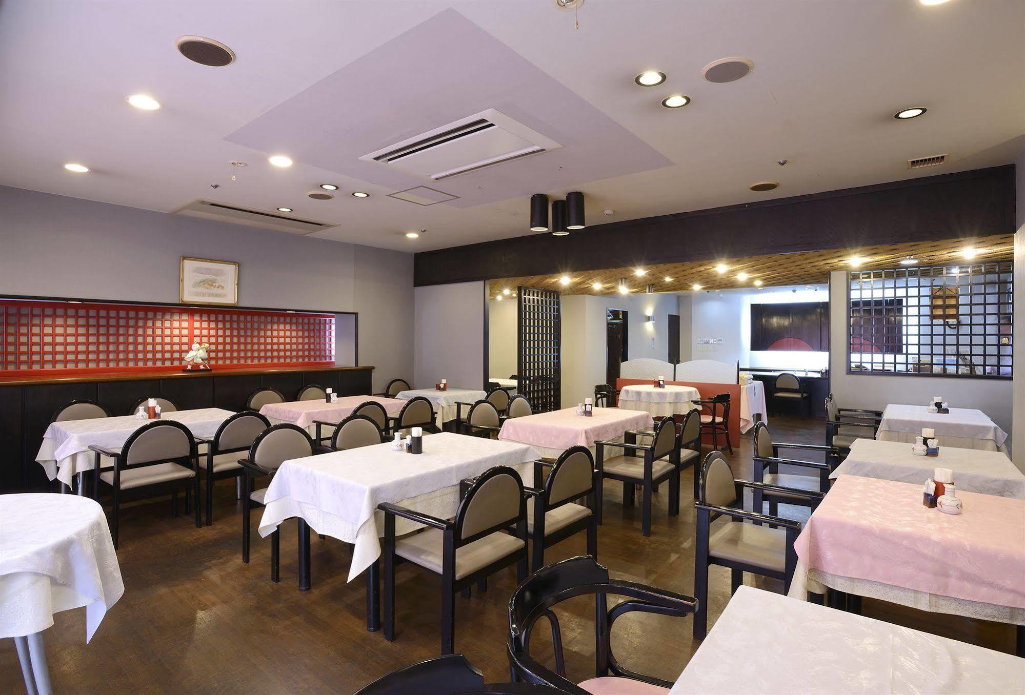 Amami Sunplaza Hotel Bagian luar foto